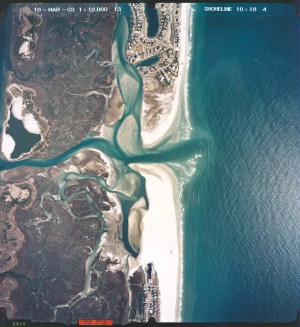 Aerial of Mason Inlet taken in early 2003; its relocation the prior year was meant to save structures at Wrightsville Beach's north end. These inlets have been dredged numerous times over the years, due to the soft, shifting nature of the sea floor. (Port City Daily photo / COURTESY U.S. ARMY CORPS OF ENGINEERS)