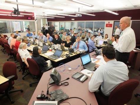 Lee discusses the day's events during Wednesday's exercise, which was held just days after the start of hurricane season. Forecasters are calling for 13 to 20 named storms this season, which started June 1. 