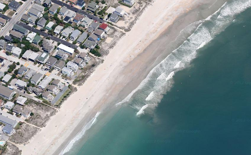Google aerial of the Wrightsville Beach strand and fronting properties.