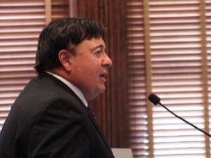 Carolina Beach Mayor Bob Lewis addressed commissioners Monday, describing the boardwalk project as an opportunity for partnership between the town and the county. Photo by Jonathan Spiers.