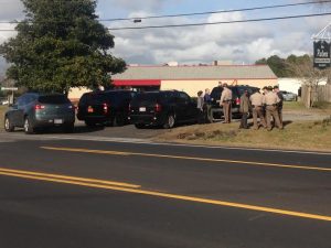 New Hanover County deputies respond to reports of shots fired at the Palms Mobile Home Park. Photo by Christina Haley. 