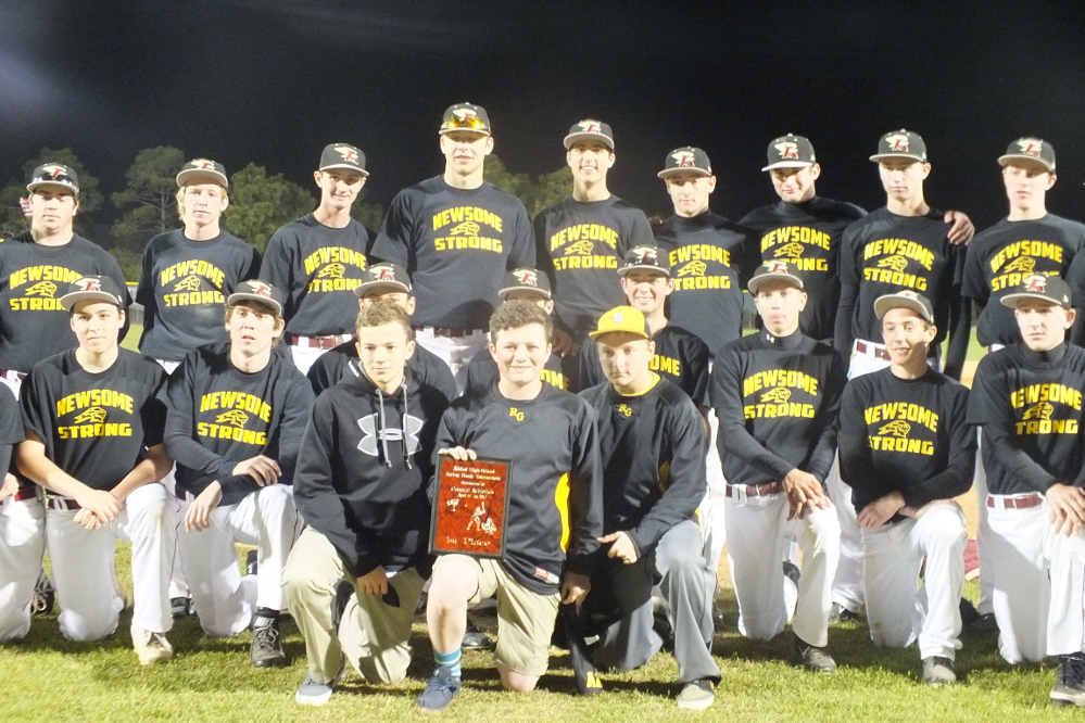 The Ashley ballclub enjoys a moment with three of Alex Newsome's teammate at Roland-Grise Middle School following a game in April 2014. Photo by- Joe Catenacci 