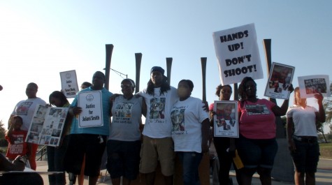 Friends and family of Brandon Smith, Tevin Robinson, Ronald Roland and Grace Denk gathered for a group photo after a peaceful protest in response to their loves ones' death. All photos by Christina Haley. 