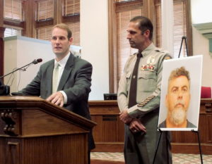 District Attorney Ben David, left, and New Hanover County Sheriff Ed McMahon, right, announced today that Larry Karl Gonzales was arrested last week in Texas and charged with first-degree murder in connection with the death of Alton Corey Vann in January 2009. Photo by Christina Haley.