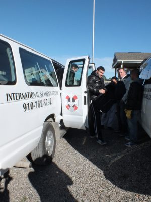 Since crews cannot leave their ships without an escort, the International Seamen's Center provides them transport through the port and around town.