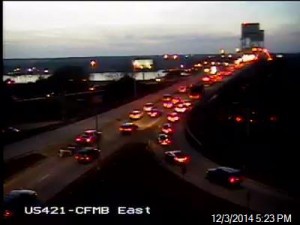 Traffic on the Wilmington side of the Cape Fear Memorial Bridge, westbound, just before 5:30 p.m. The Front Street on-ramp can be seen at lower right. Image courtesy NCDOT.