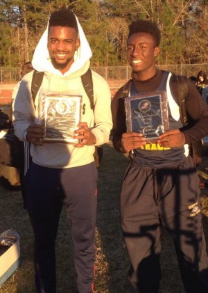 Latrell Hill, left, and Jayhlen Washington enjoy a moment after the conference championship. Photo courtesy North Brunswick Athletics 