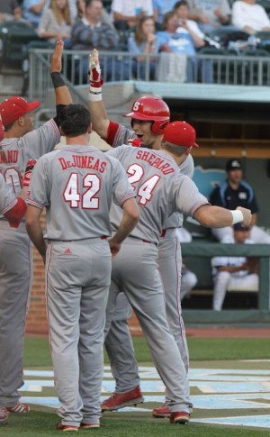 Shane Shepard is congratulated by his brother Chance and the rest of the NC State ballclub after his first career home run. Photo courtesy- John Crouch