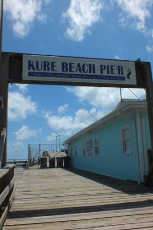Kure Beach Fishing Pier sign. Photo by Hannah Leyva.
