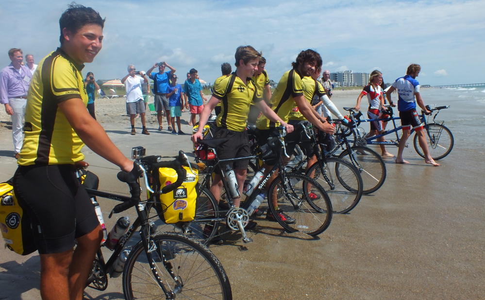 The boy scouts ended their trip by dipping their front wheels into the Atlantic Ocean. Photos by Joe Catenacci
