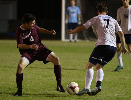 Josh Barnello, left and Keaton Simmons battle for possession. Photo courtesy- Rodney Williams