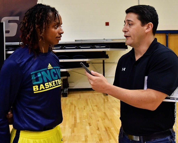 Naqaiyyah Teague, left and Joe Catenacci talk during media day. 