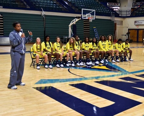 Coach Adell Harris introduces her team to the media. Photos courtesy- UNCW Athletics
