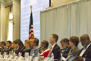 A panel of local government, education, business and non-profit leaders, anchored by Wilmington Mayor Bill Saffo (far left) and New Hanover County Board of Commissioners Chair Jonathan Barfield Jr. (far right), discuss affordable housing.