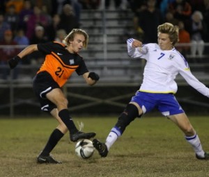 Nathaniel Lorenz, right, and Paul Horning battle for possession. 