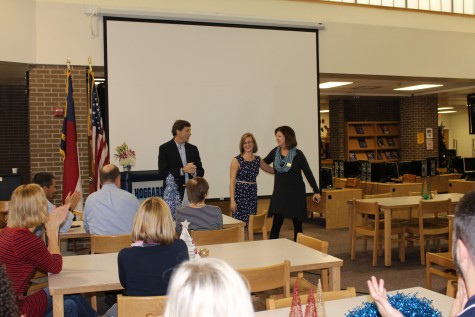 Cindi Rigsbee, right, from the N.C. Department of Public Instruction, and Superintendent Tim Markley helped deliver the news to Snyder to a crowd of her peers.