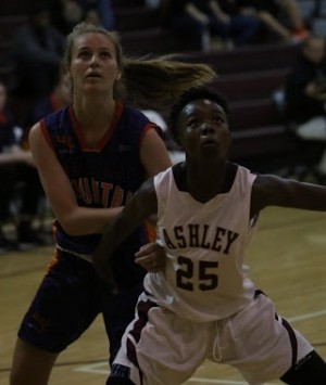 Serenity Williams boxes out her counterpart from South Australia. 
