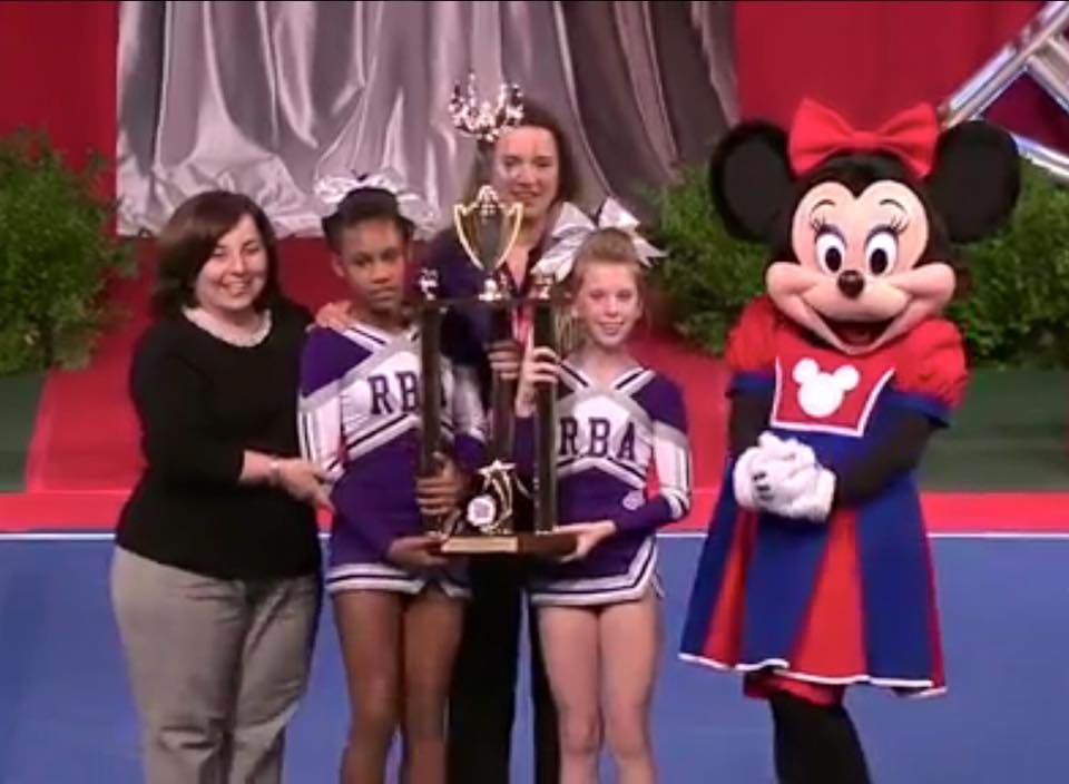 Pictured: (Receiving 1st place trophy) Beth Deitz, National Cheer and Dance Coordinator; Alleigha Dixon, athlete; Jean Lafave, Head Coach/Cheer and Dance Coordinator; Lindsay Butler, athlete. 