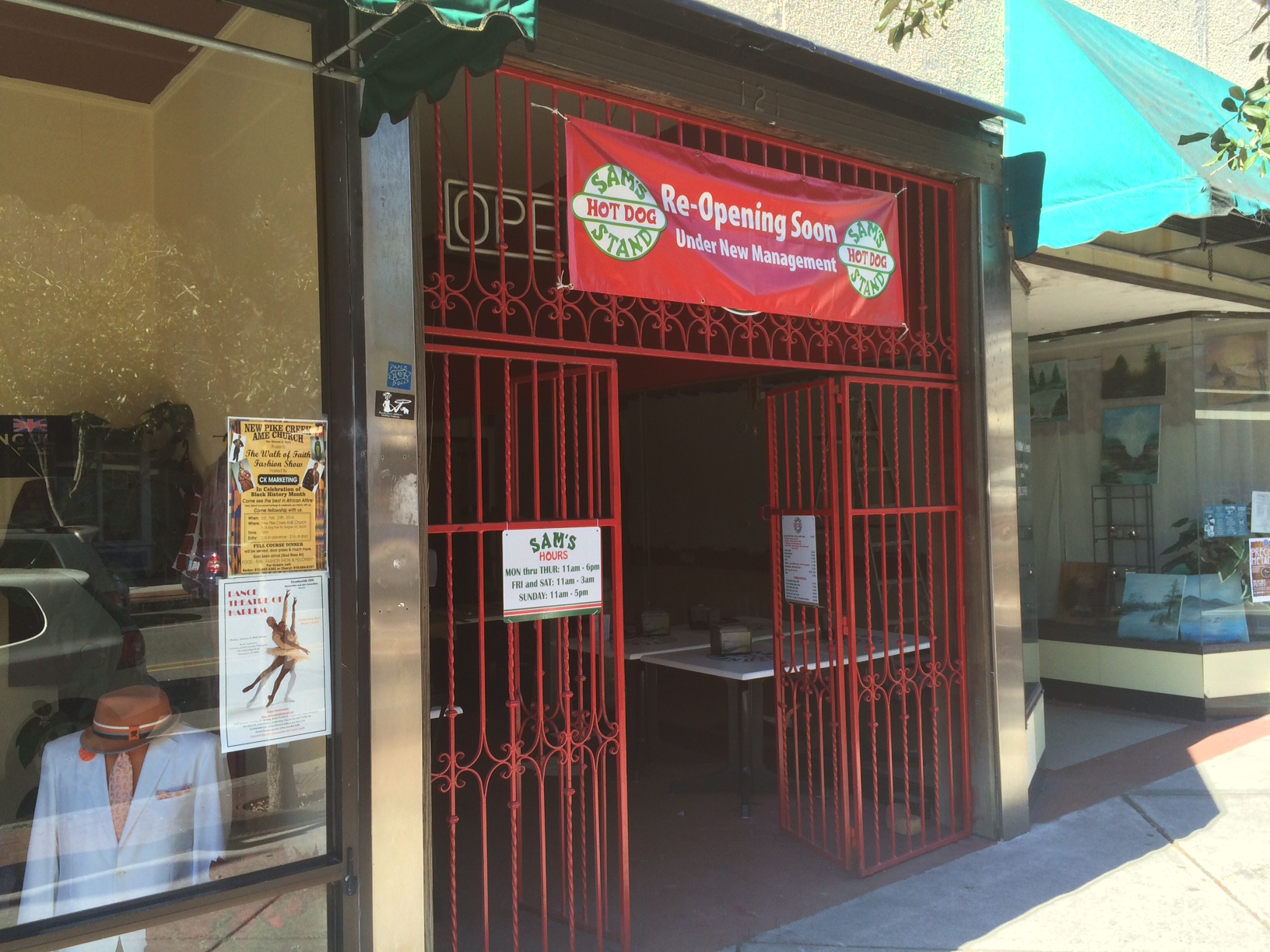 A sign announces the reopening of a hot dog restaurant at 121 N. Front St., this time as Sam's Hot Dog Stand. Photo by Hilary Snow.