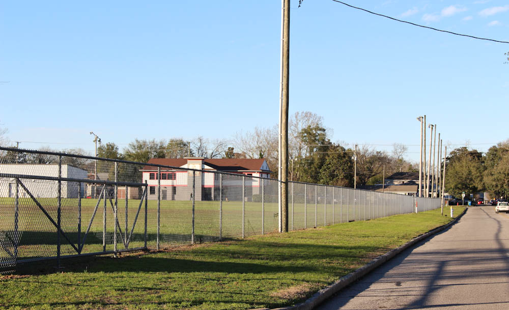 The Safe Routes to School project would install sidewalks on the west side of 13th Street between Ann and Castle Streets next to a field used for practice by New Hanover High School athletic teams. Photo by Hannah Leyva.