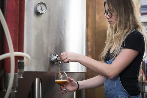 At 26, Kelsie Cole of Front Street Brewery is the youngest female brewer in the state. Courtesy photos.