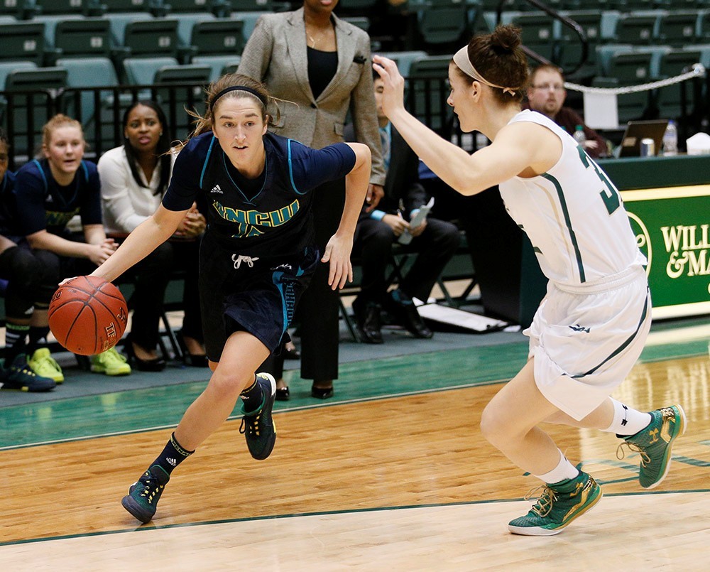 Madison Raque drives the lane for UNCW. Photo courtesy- UNCW Athletics 