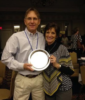 Michael Bowen, left, along with North Carolina Tennis President, Anna Martin. Photo courtesy- Hoggard Athletics