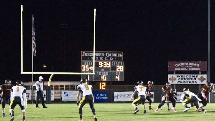The scoreboard at Jurgensen-Gabriel field at Legion Stadium during a New Hanover High School football game last fall. Photo by Hannah Leyva.