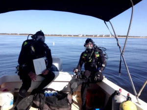Archaeologist Greg Stratton, right, with East Carolina University grad-student Hoyt Alexander, diving on the recently discovered Civil War-era shipwreck. Photo courtesy of the N.C. Department of Natural and Cultural Resources. 