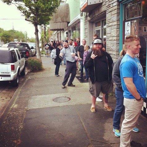 Vinyl collectors line up outside Gravity during last year's Record Store Day. Keen said the event annually draws hundreds to his store, many who show up long before opening time.