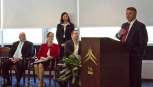 From left: officials Scott Satterfield, Beth Dawson, Julie Wilsey and Jonathan Crane look on as AT&T's John Lyon speaks. Photo by Hannah Leyva.