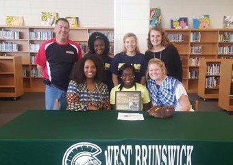 Randasia Daniels is joined by friends and family as she makes her college announcement. Photo courtesy- West Brunswick Athletics.