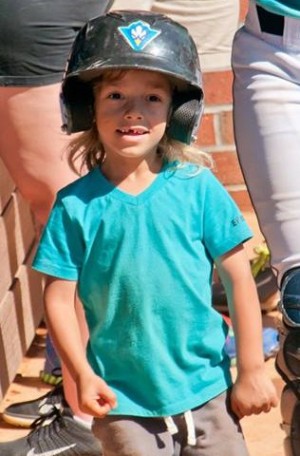 Ashtin Gerberg in the dugout at a UNCW softball game this spring. Photo courtesy- Dennis Brown. 