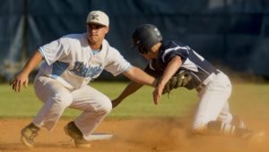 Brad Pennington tags out a runner during Saturdays victory. Photo courtesy- Mike Gans. 