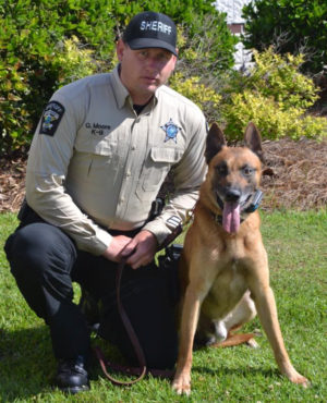 Deputy Q. Moore and K9 Dickey