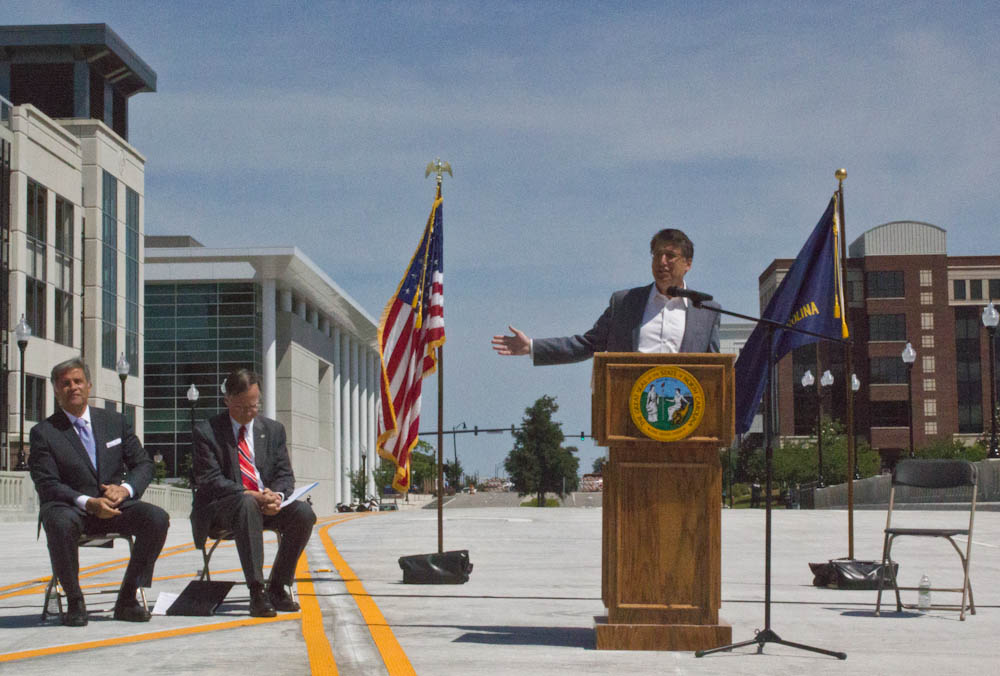 L to R: Wilmington Mayor Bill Saffo, North Carolina Sec. of Transportation Nick Tennyson and Gov. Pat McCrory spoke at the Third Street Bridge opening. Photo by Hannah Leyva.