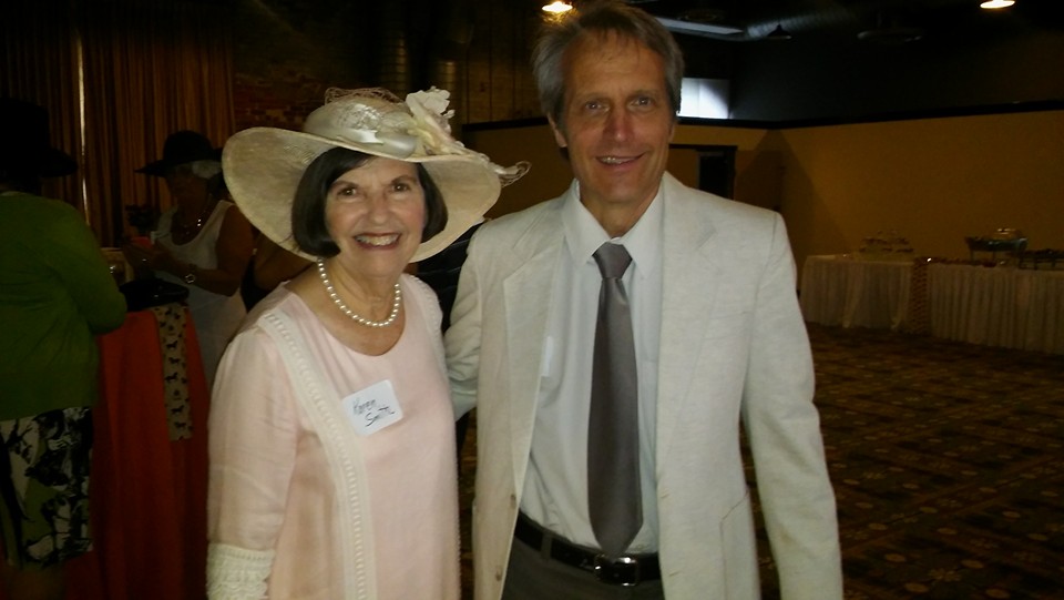 Wilmington Symphony board president Karen Smith and longtime conductor Steven Errante celebrate a recent legacy gift and move to a downtown venue during the group's Kentucky Derby fundraiser last week. Courtesy photo.