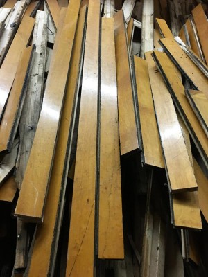 The salvage store resells charming scrap materials--like these 1950s floor boards from the old Tileston school--that would otherwise end up in the landfill. 