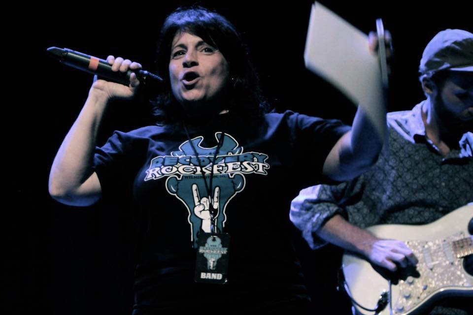 Nyla Cione addresses the audience at last year's Recovery Rock Fest. This time around, the musician and promoter is planning the celebration of clean living as a free event at an outdoor venue. Courtesy photo.