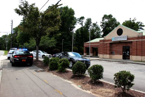 Wilmington police on the scene of a robbery at the federal credit union on the corner of Oleander Drive and Independence Boulevard. Photo by Christina Haley.