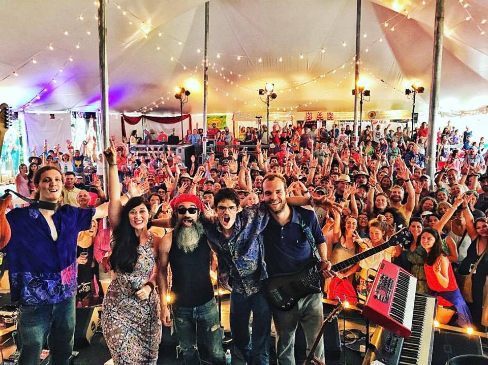 Rebekah Todd and The Odyssey pose on stage in front of the crowd during their last performance at FloydFest 16. Contributed photo.