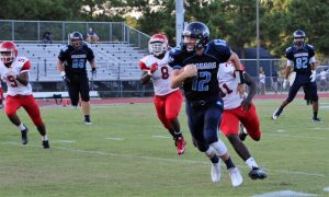 Hoggard Quarterback Josh Jones takes off for a big run on Friday against the Fayetteville 71st School Falcons.