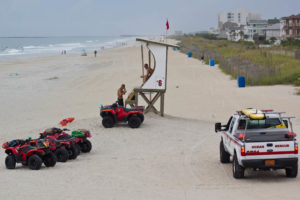 Lifeguards with Wrightsville Beach Ocean Rescue raised red flags prepared for dangerous conditions on Wednesday morning. Photo by Hannah Leyva.