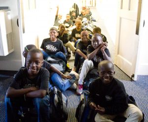 Members of the African Children's Choir 46 wait to meet their Wilmington host families. Photo by Hannah Leyva.