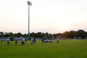 Young football and soccer players practicing on Ogden Park's athletic fields. Photo by Hannah Leyva.