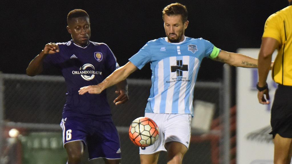 Liam Miller, right, grab an assist in Wednesday's win. Photo courtesy- Wilmington Hammerheads FC. 