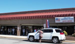 There were lines of people and cars waiting to vote at the New Hanover County Government Center early voting location on Thursday. (Photo by Hannah Leyva.)