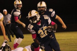 Jc Smith continues to anchor a strong run game for North Brunswick. Photo courtesy- Cape Fear Photography.