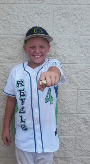 Connor Shaw flashes his hard ware after bringing home the championship. 