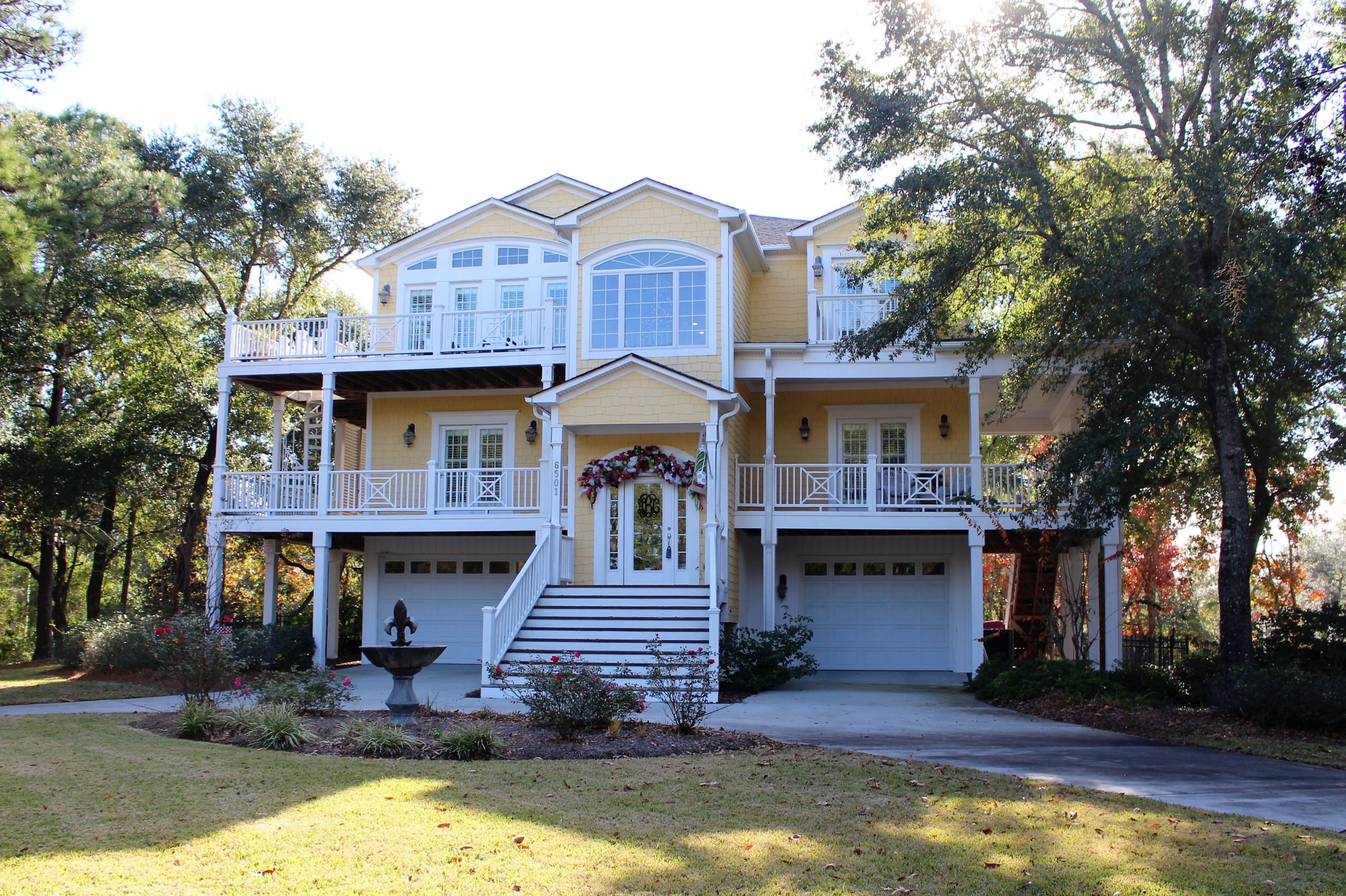This riverside home features a unique outdoor entertainment area perfect for families who play outdoors. Photos by Christina Haley.